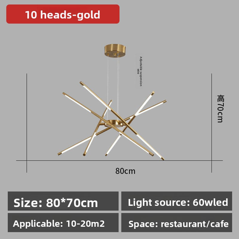 Gold chandelier with dimensions and specifications on a gray background