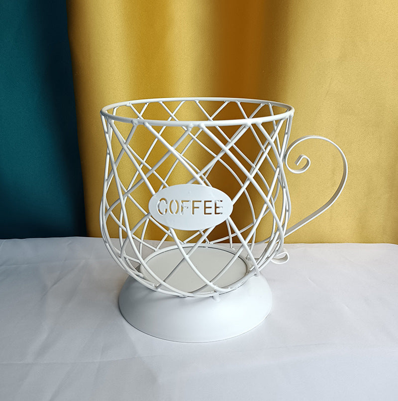 White wire  coffee capsules holder with 'COFFEE' label on a white surface against a yellow and blue background