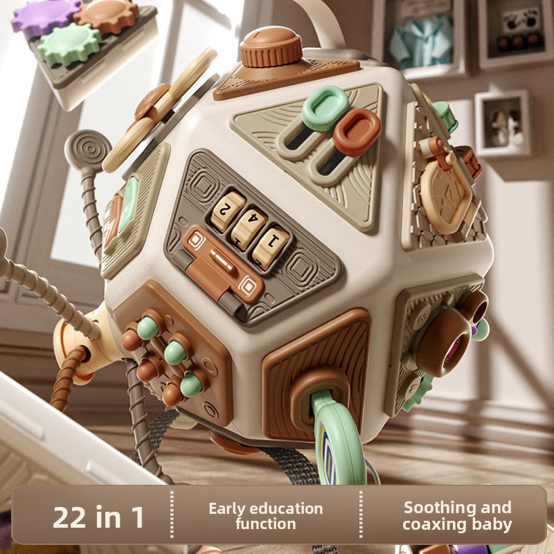 Multifunctional baby toy with various textures and colors in a room setting