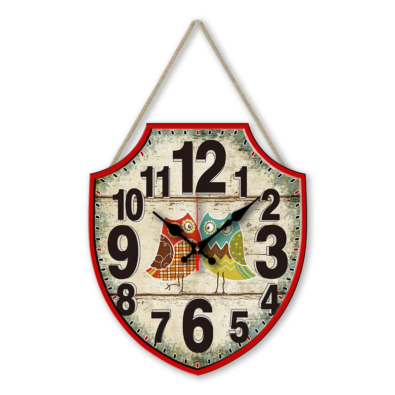 Decorative wall clock with colorful birds design on a white background