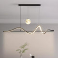 Modern pendant light with wavy design on a neutral background