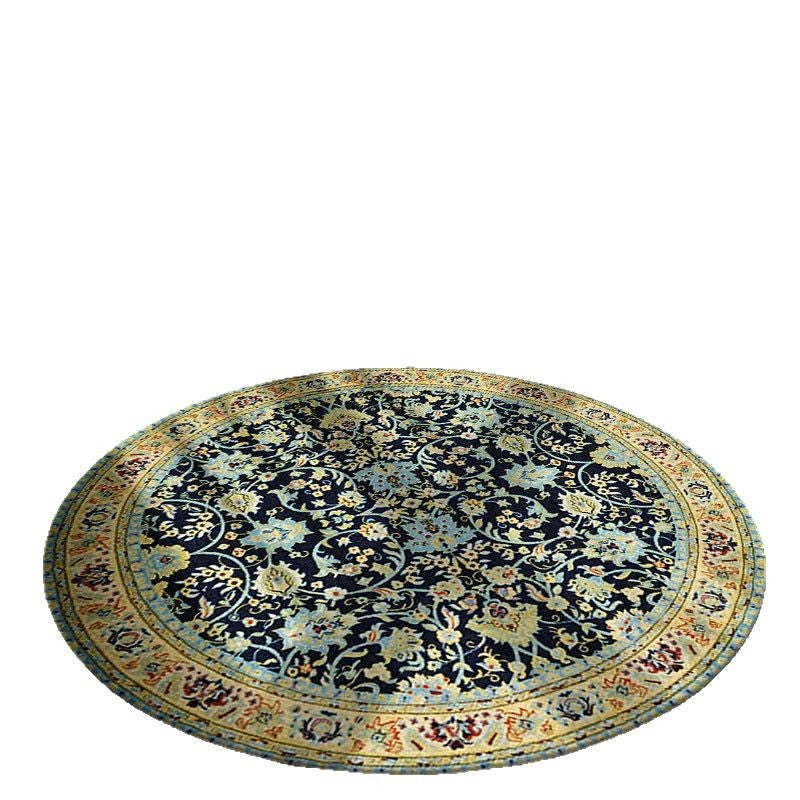 Round floral patterned rug on a white background