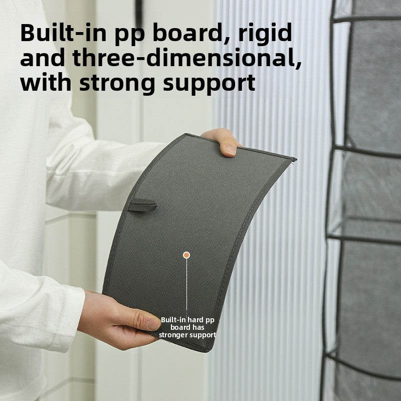 Person holding a gray, three-dimensional board with text about its support properties.