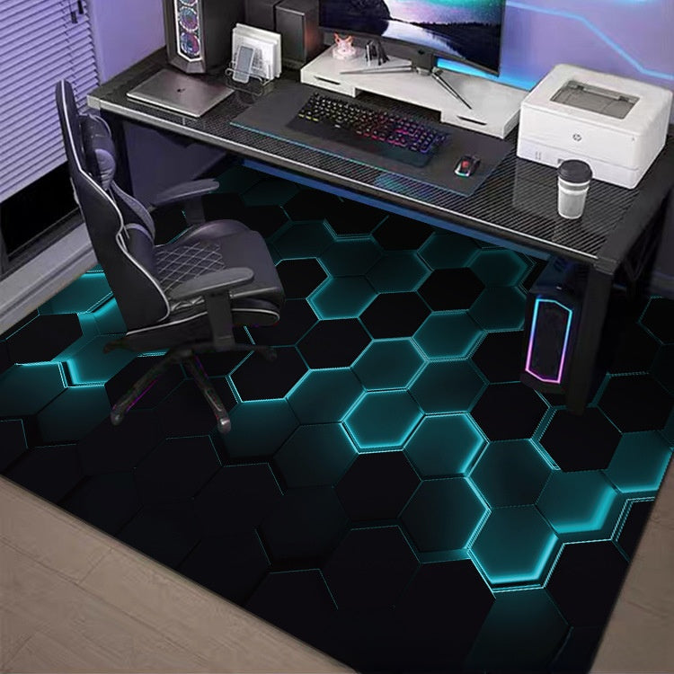 Modern gaming setup with a desk, chair, and computer equipment on a hexagonal patterned floor.