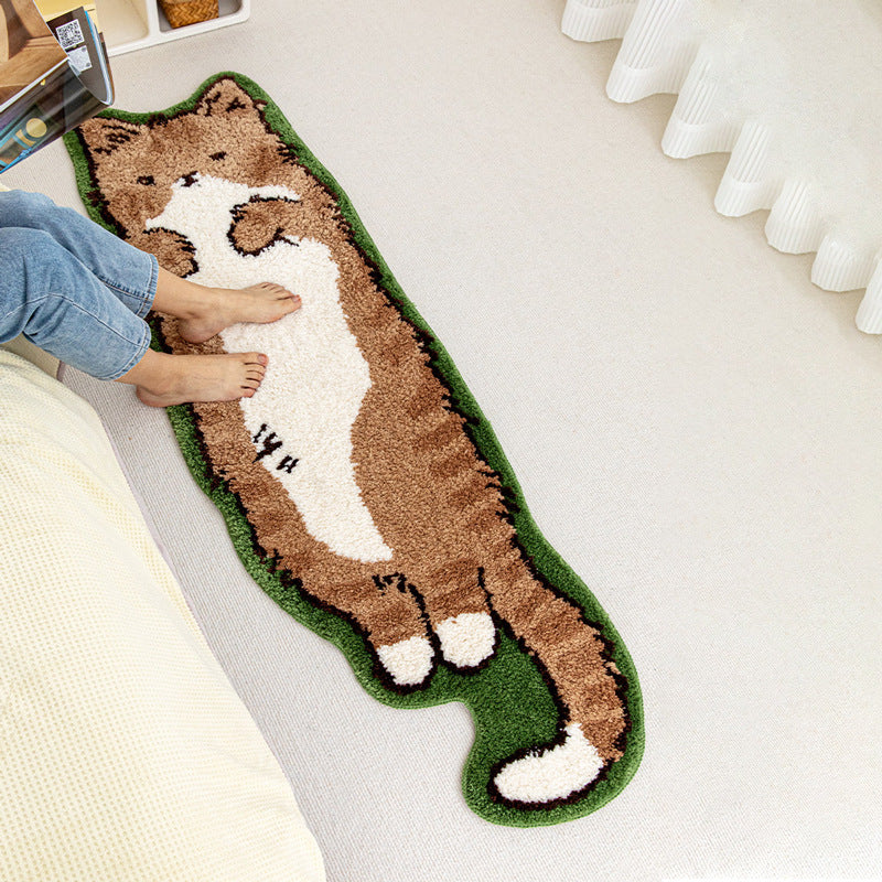 Cat-shaped rug on a light-colored floor with a person stepping onto it.