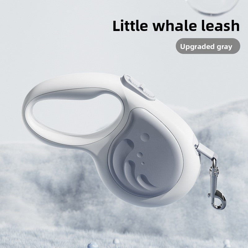 Gray pet leash with whale design on a light gray background