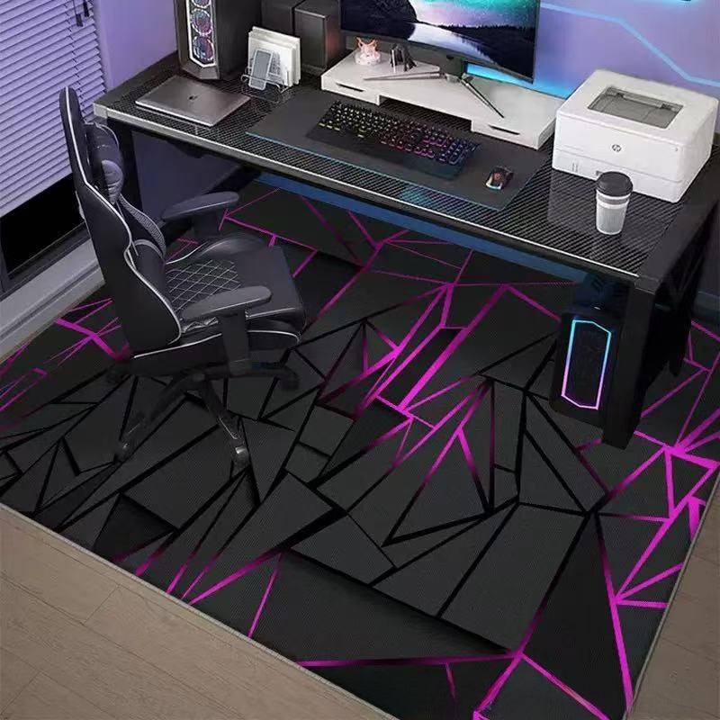 Modern gaming desk with computer setup on a geometric-patterned rug.