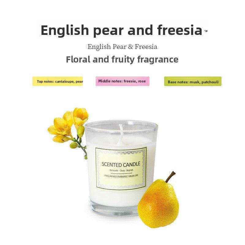 Scented candle with English pear and freesia fragrance, featuring a pear and freesia flower on a white background.
