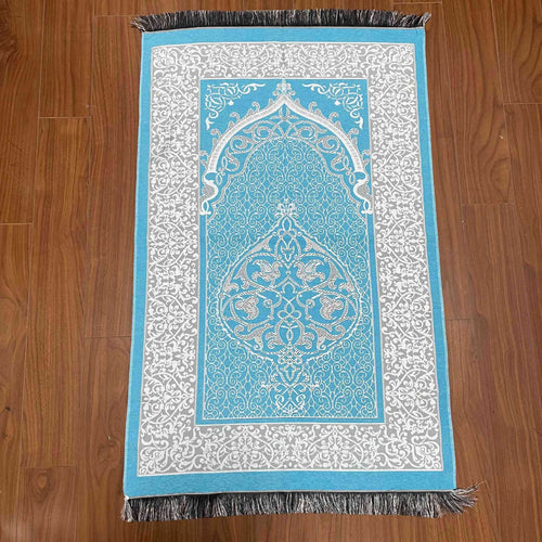 Decorative rug with intricate patterns on a wooden floor