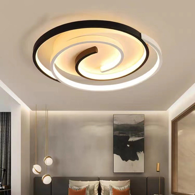 Modern ceiling light fixture in a bedroom setting