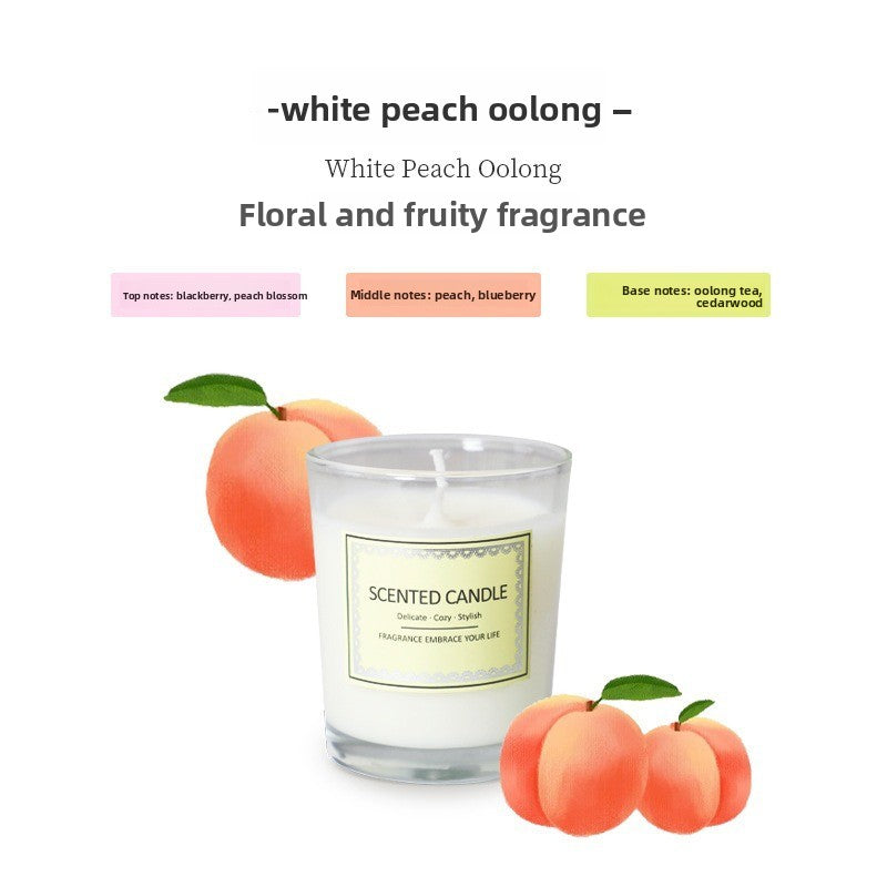 Scented candle labeled 'White Peach Oolong' with peach illustrations and fragrance notes on a white background.