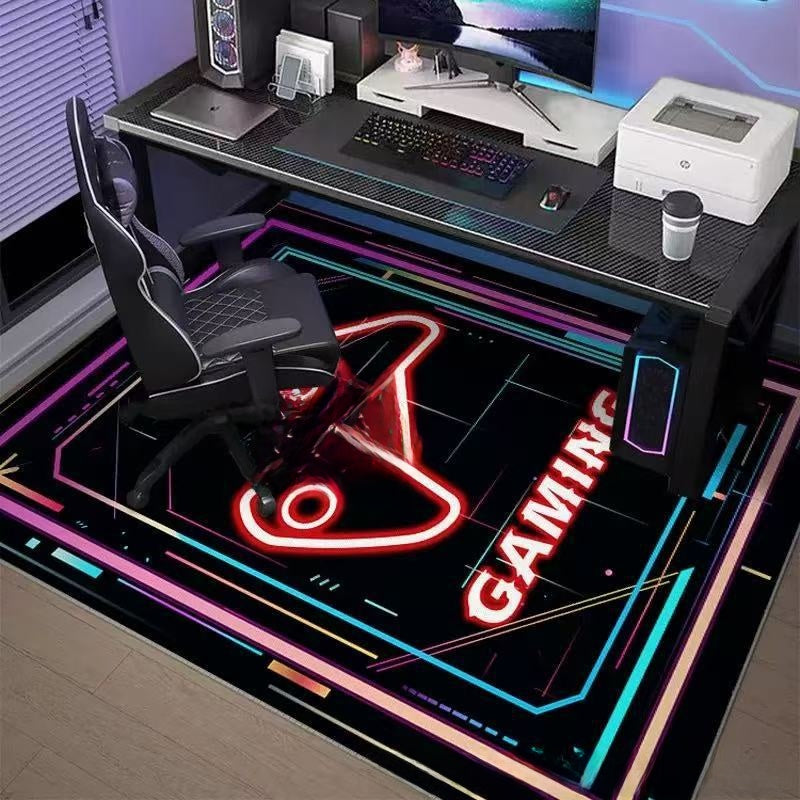 Gaming desk setup with chair, computer equipment, and a neon 'Gaming' sign on the floor.