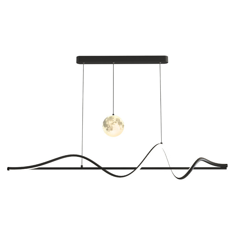 Modern black pendant light with a hanging bulb on a white background