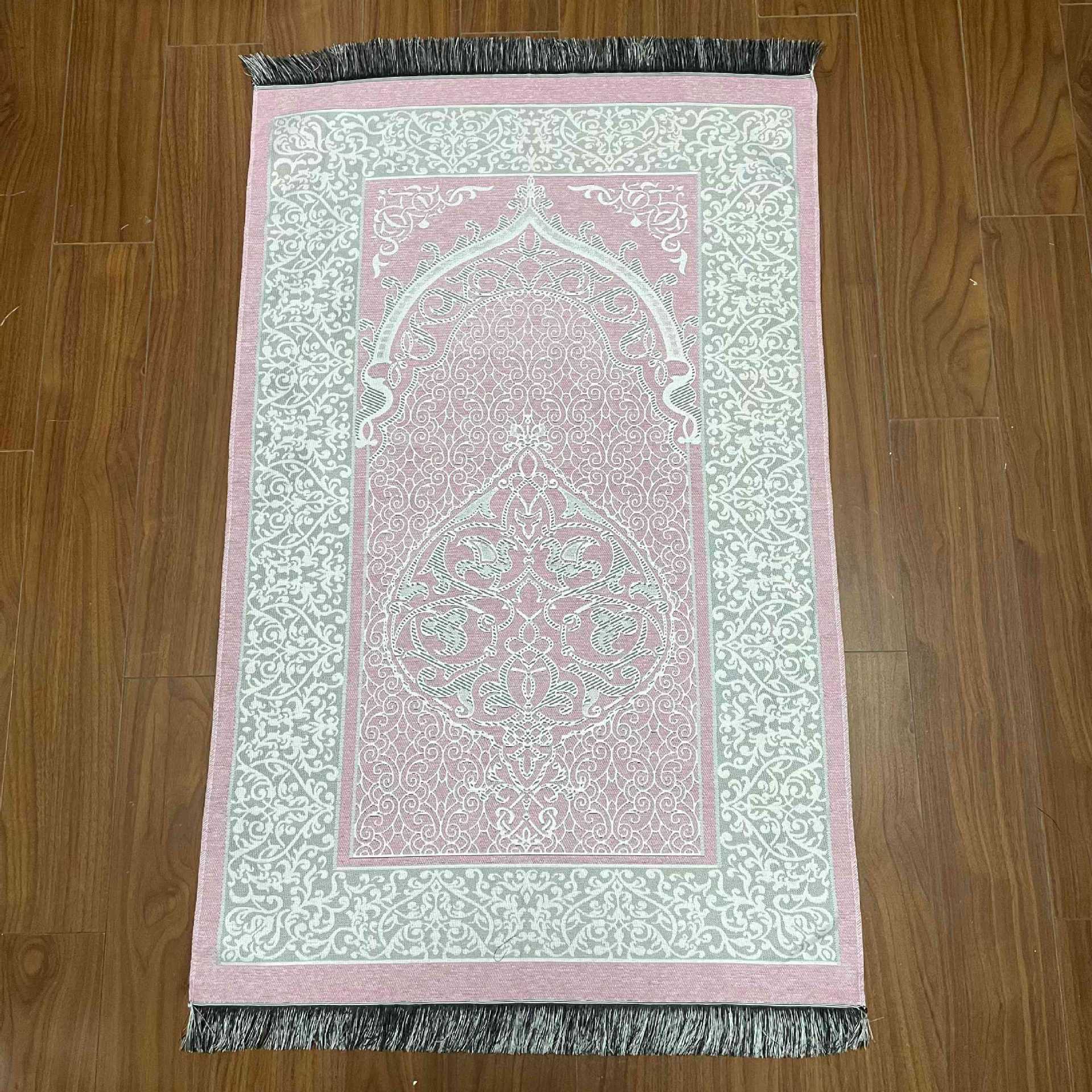 Decorative rug with intricate patterns on a wooden floor