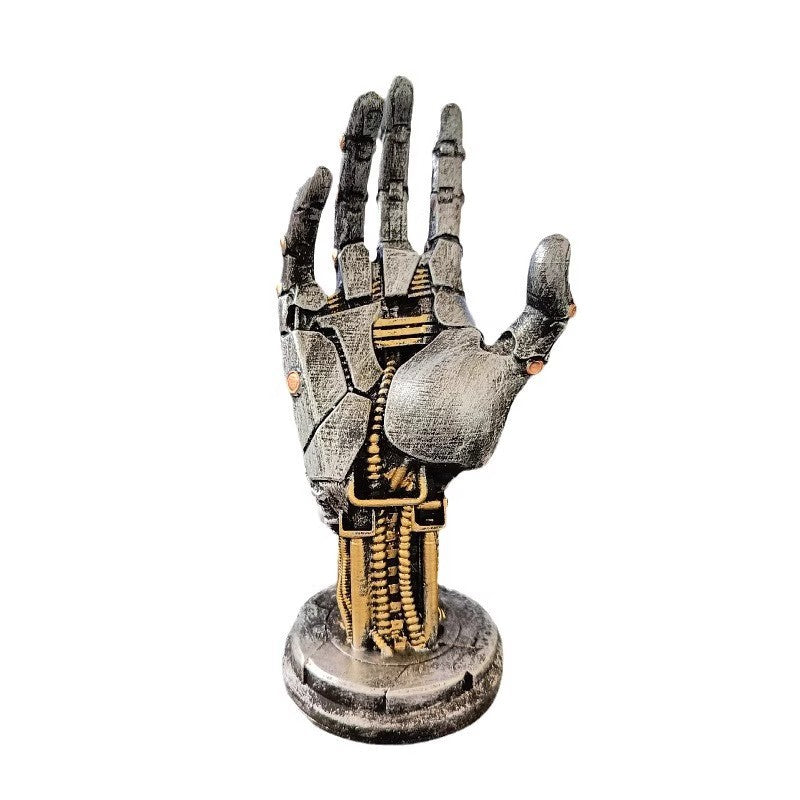 Mechanical hand sculpture on a white background