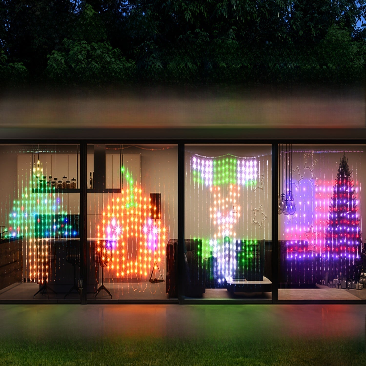 Modern house with LED lights spelling out 'LOVE' on a dark night.