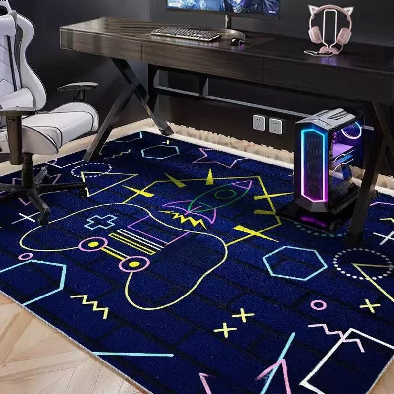 Gaming setup with a colorful rug featuring geometric designs, a desk, chair, and computer equipment.