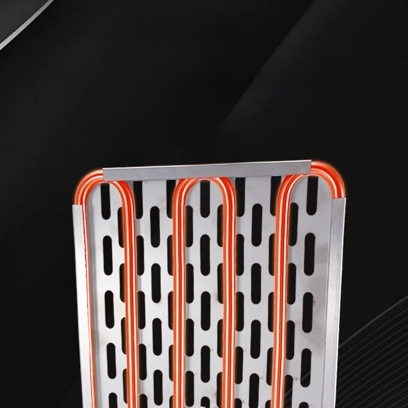 Metallic heat exchanger with orange pipes on a black background