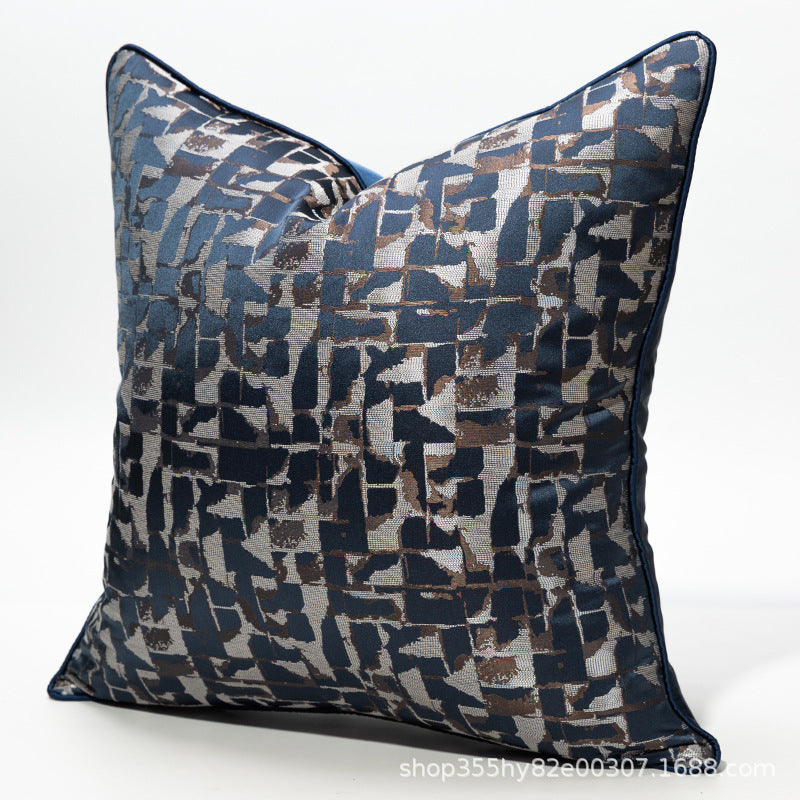 Decorative pillow with geometric pattern on a white background