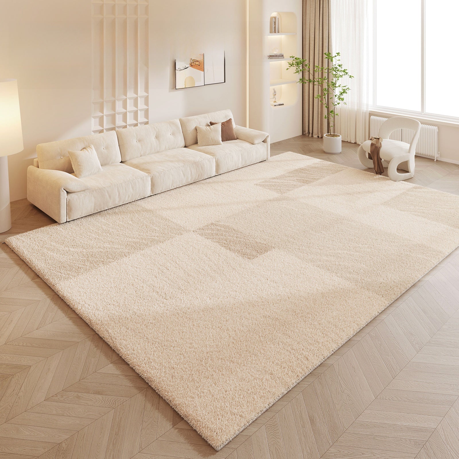 Beige rug on a wooden floor in a living room with a sofa and decor.
