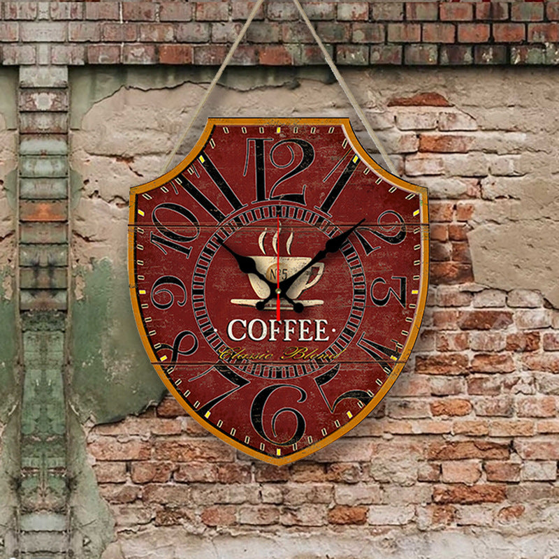 Decorative clock with 'Coffee' theme on a brick wall