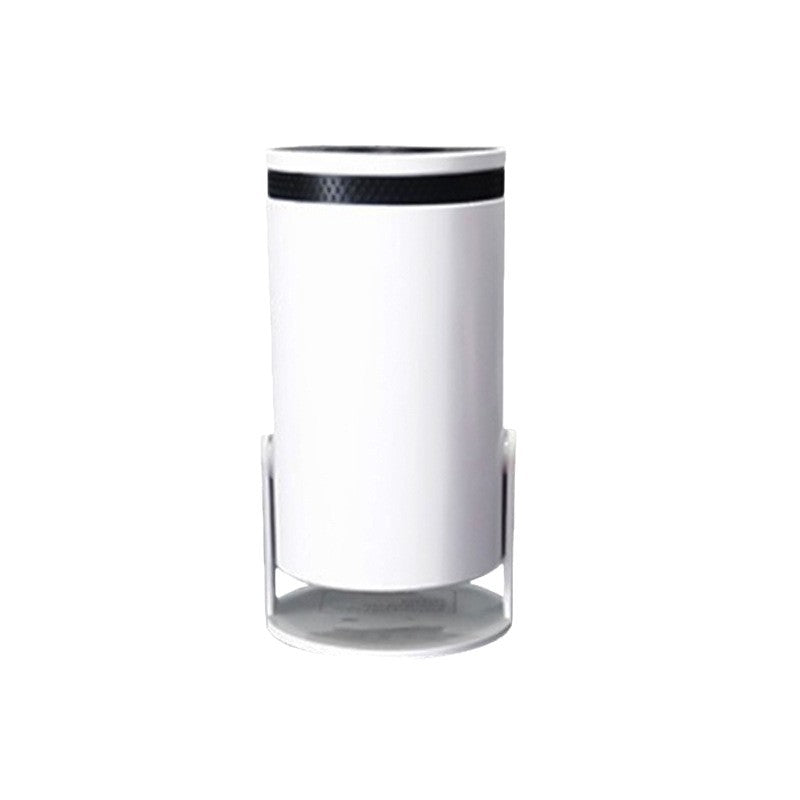 White projector with black lid on a white background