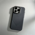Carbon fiber phone case on a light gray background