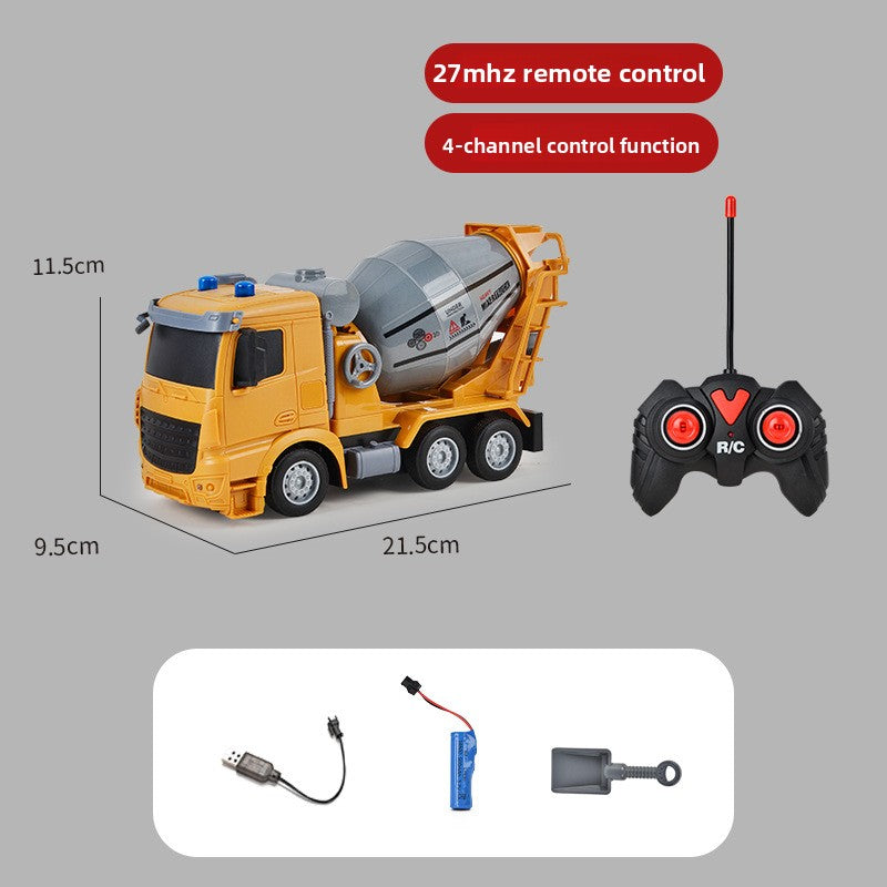 Toy concrete mixer truck with remote control, battery, and charger on a gray background