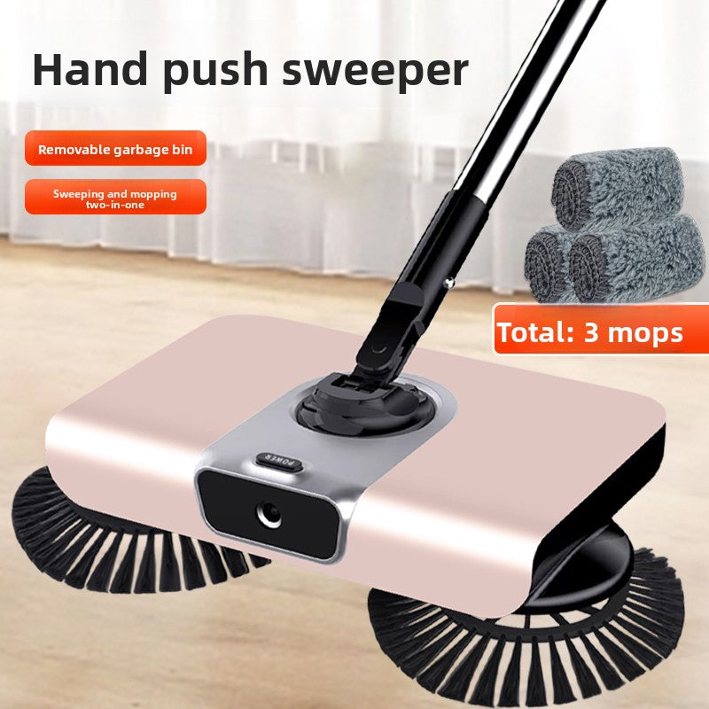 Hand push sweeper with removable garbage bin on a wooden floor