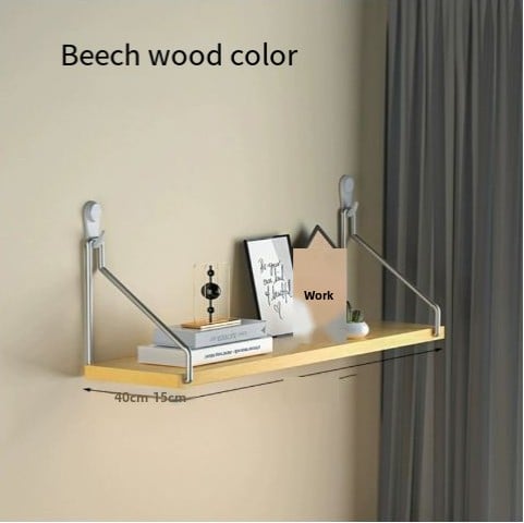 Beech wood color wall shelf with books and decor items on a beige wall.