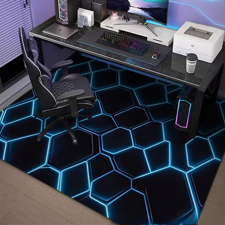 Modern gaming desk with chair, computer setup, and a unique geometric floor design.