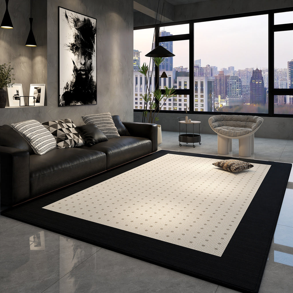 Modern living room with a black sofa, white rug, and cityscape view.