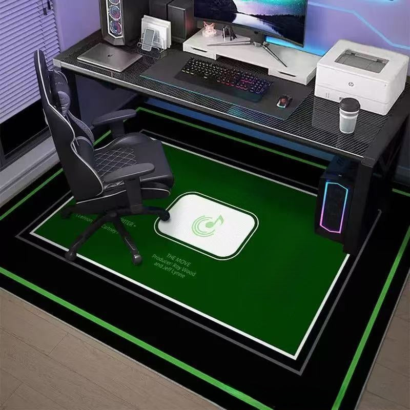 Gaming desk setup with a chair, computer equipment, and a green mouse pad.