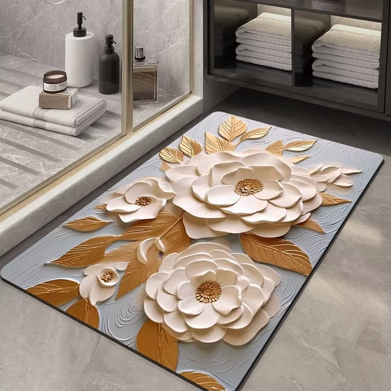 Floral design rug on a bathroom floor with towels and toiletries in the background