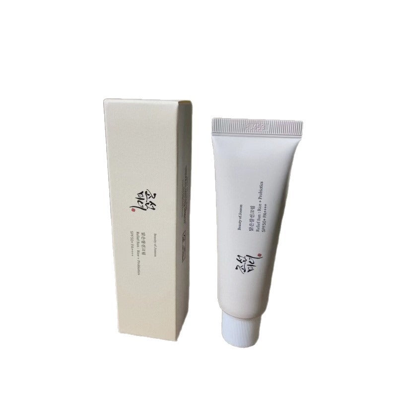 White tube and box with text on a white background