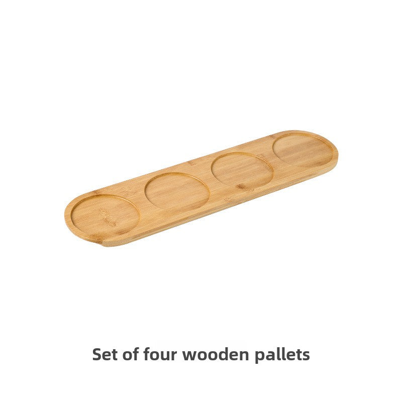 Set of four wooden pallets on a white background