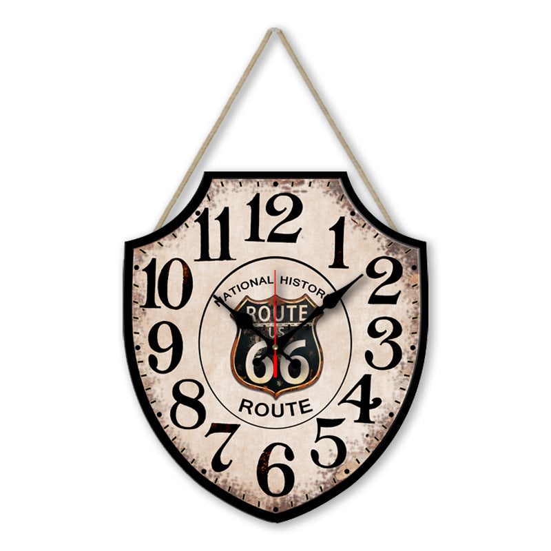 Vintage-style clock with Route 66 design on a white background
