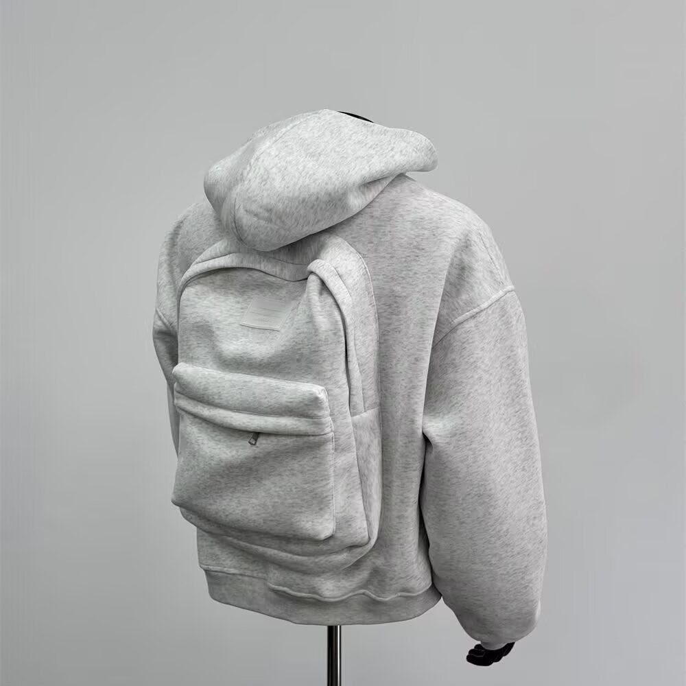 Gray hoodie on a mannequin against a gray background