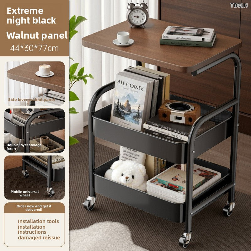 Multifunctional trolley with a wooden top and storage shelves, featuring books and a teddy bear.
