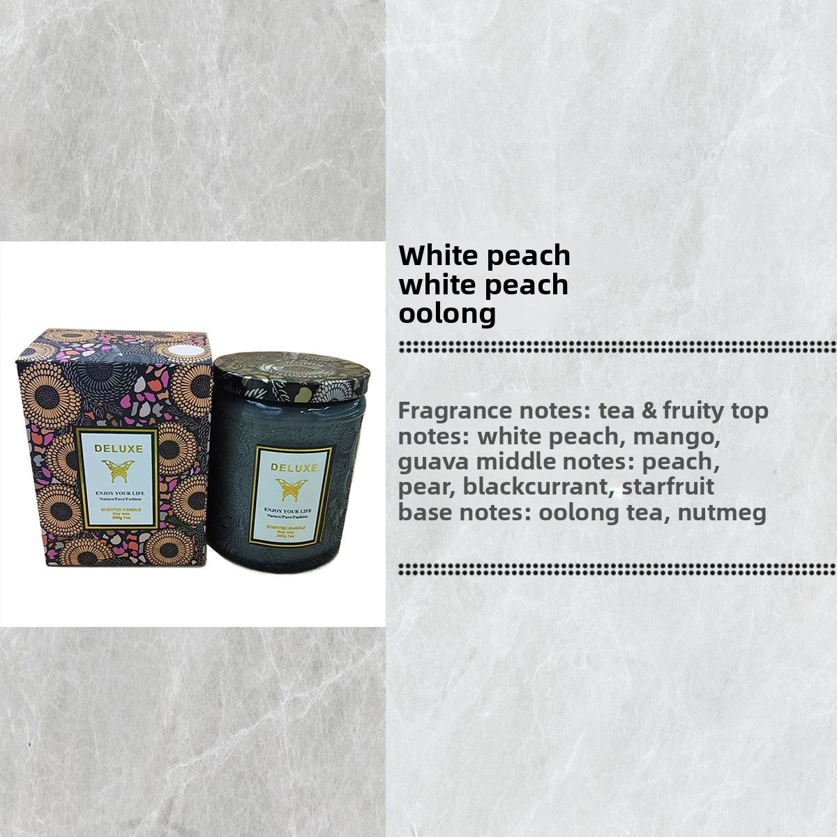 Candle with packaging and fragrance information on a textured gray background