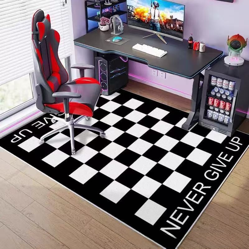 Gaming setup with a black and white checkered rug, gaming chair, and desk.