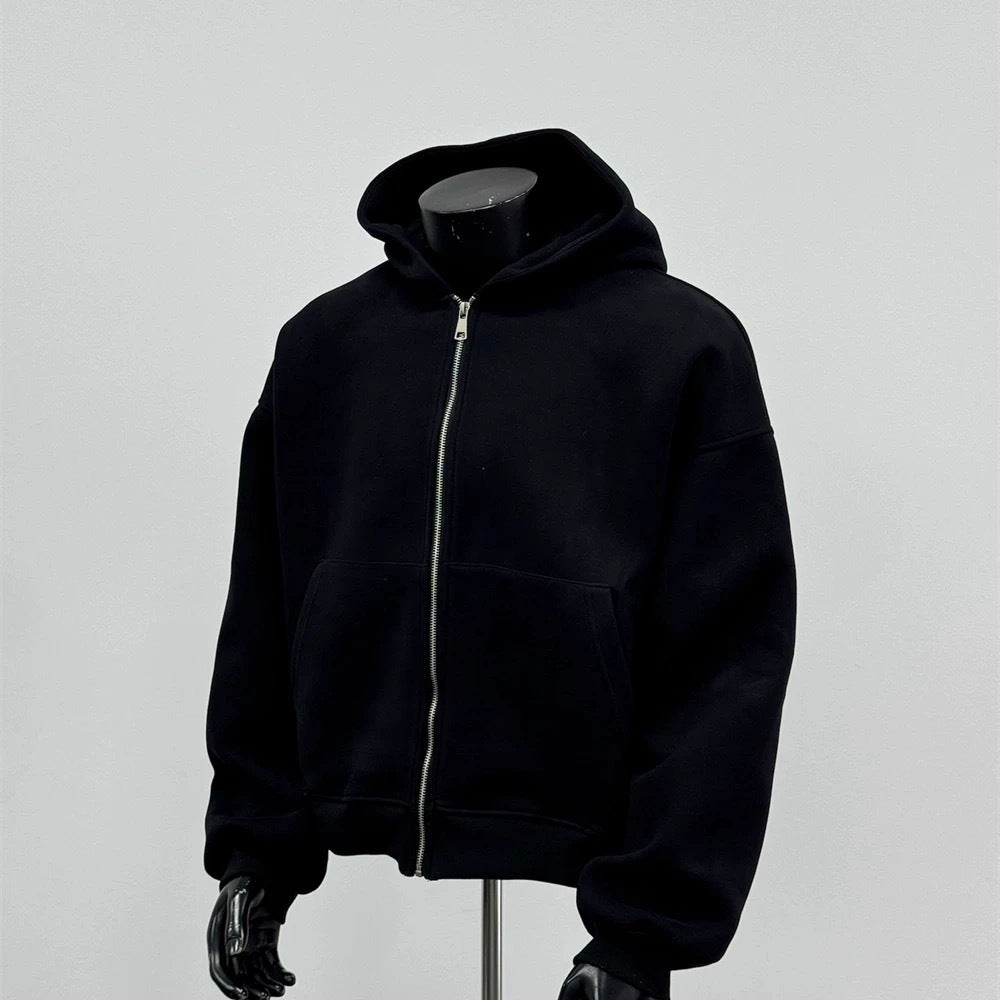 Black hoodie on a mannequin against a gray background