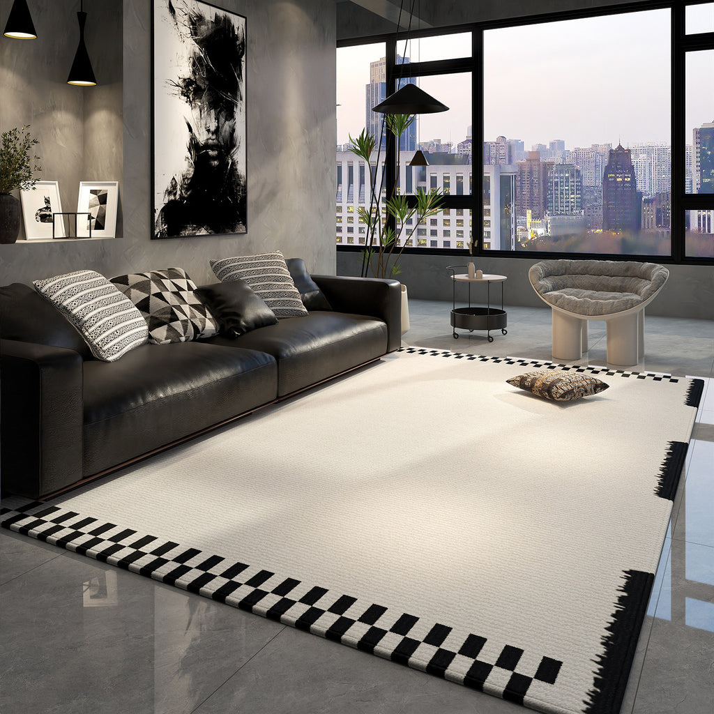 Modern living room with a black and white checkered rug, leather sofa, and cityscape view.