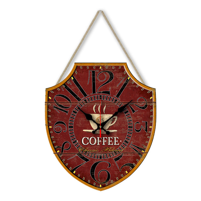 Decorative wall clock with coffee theme on a white background