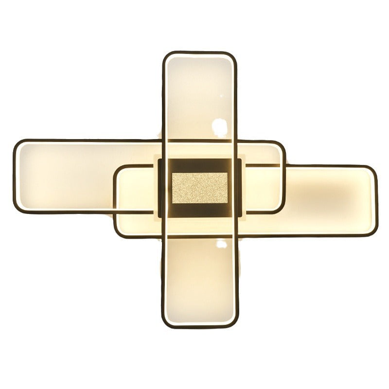 Modern wall light fixture with geometric design on a white background