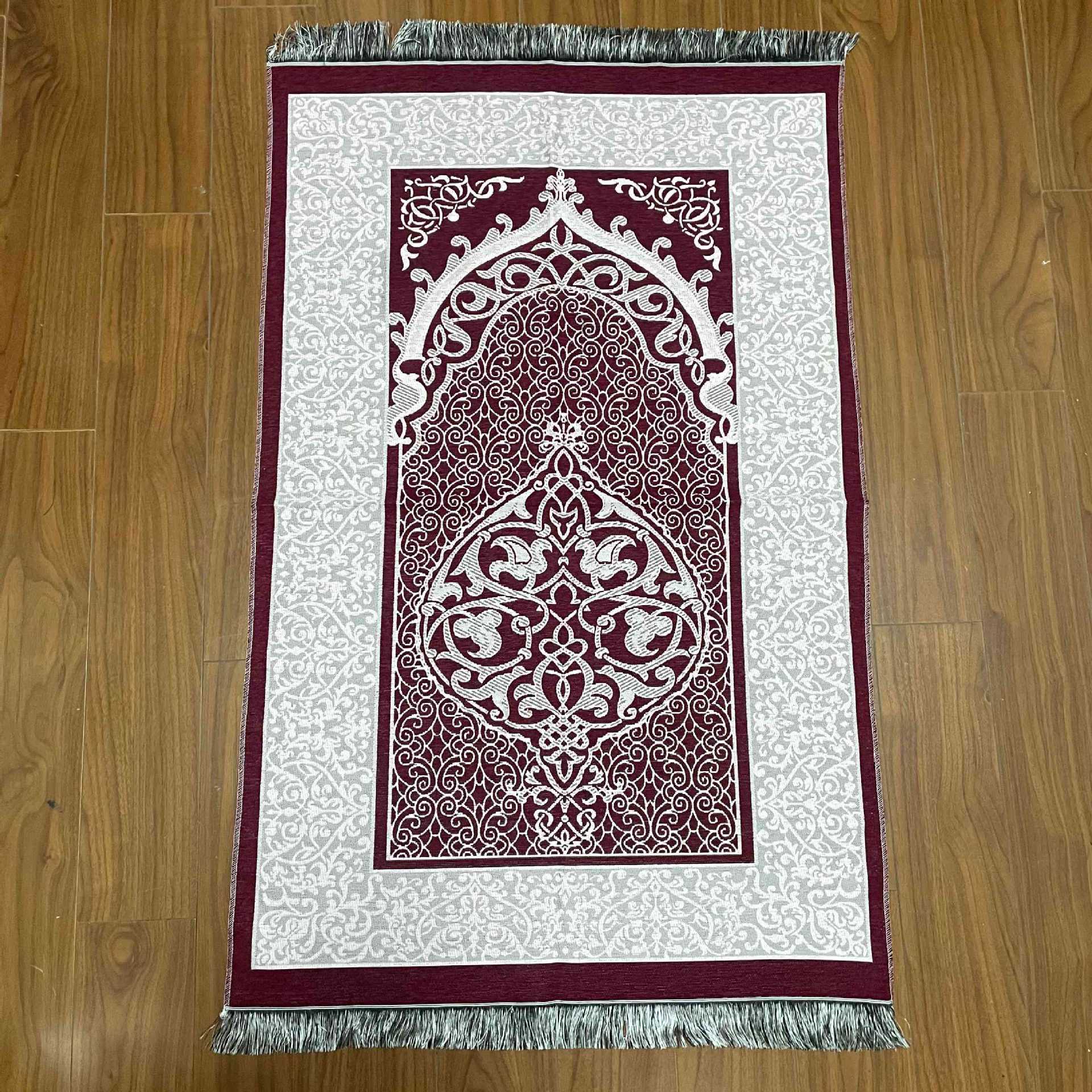 Decorative rug with intricate patterns on a wooden floor