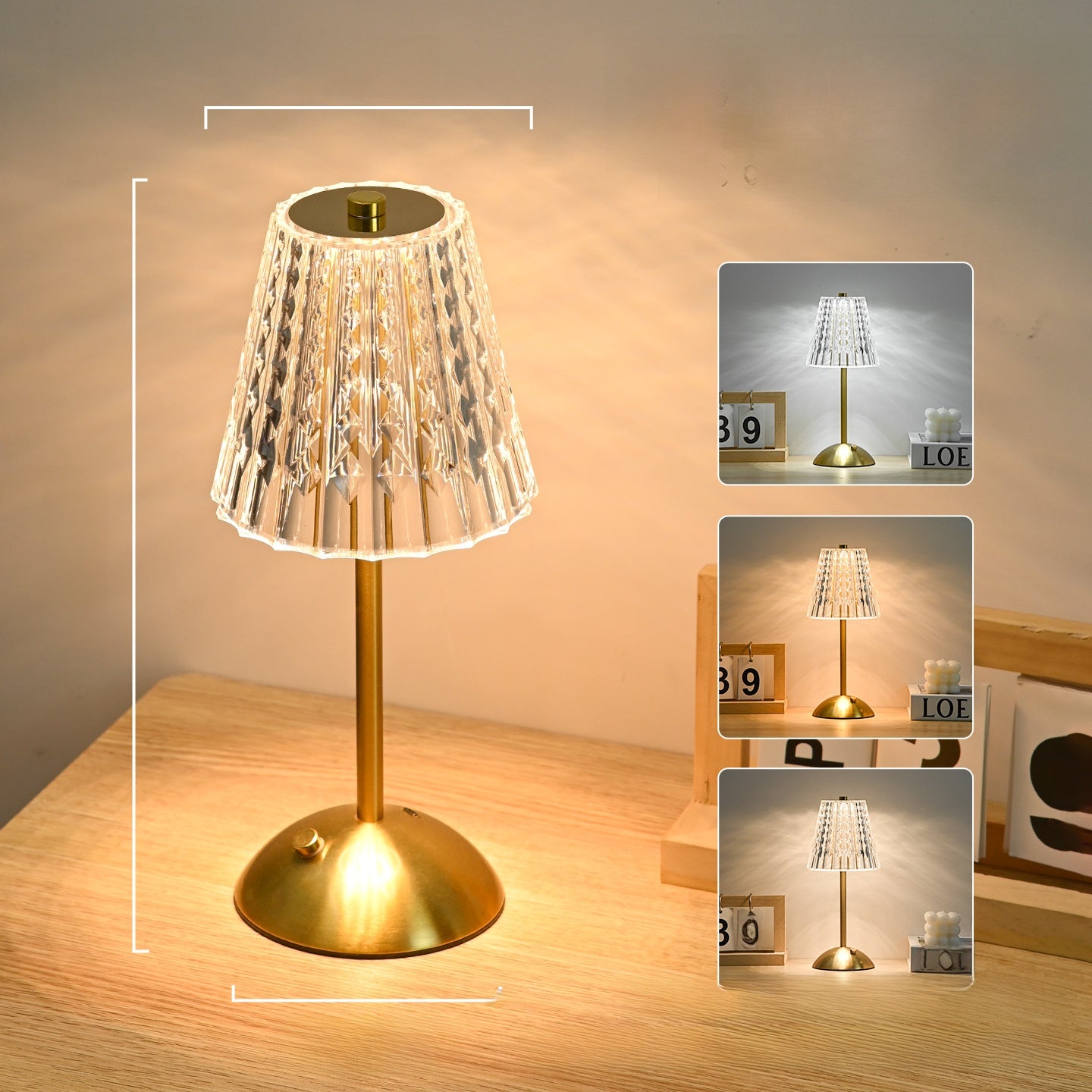 Decorative table lamp with a gold base and white lampshade on a wooden surface.