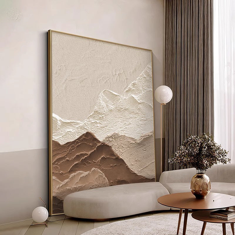 Modern living room with a large abstract mountain painting on the wall.