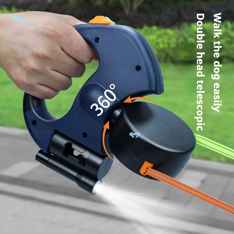 360-degree dog leash holder with a hand holding it, on a grassy background.