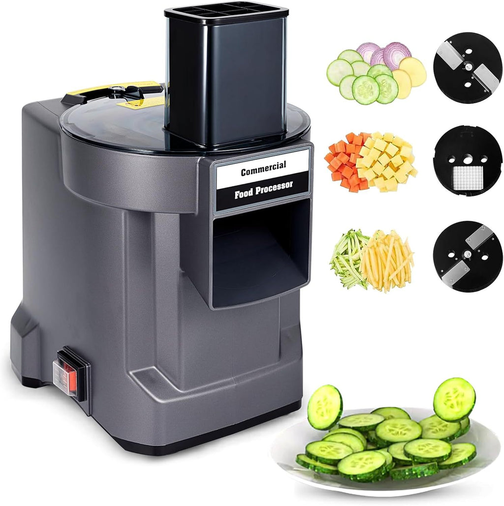 Commercial food processor with sliced vegetables and attachments on a white background